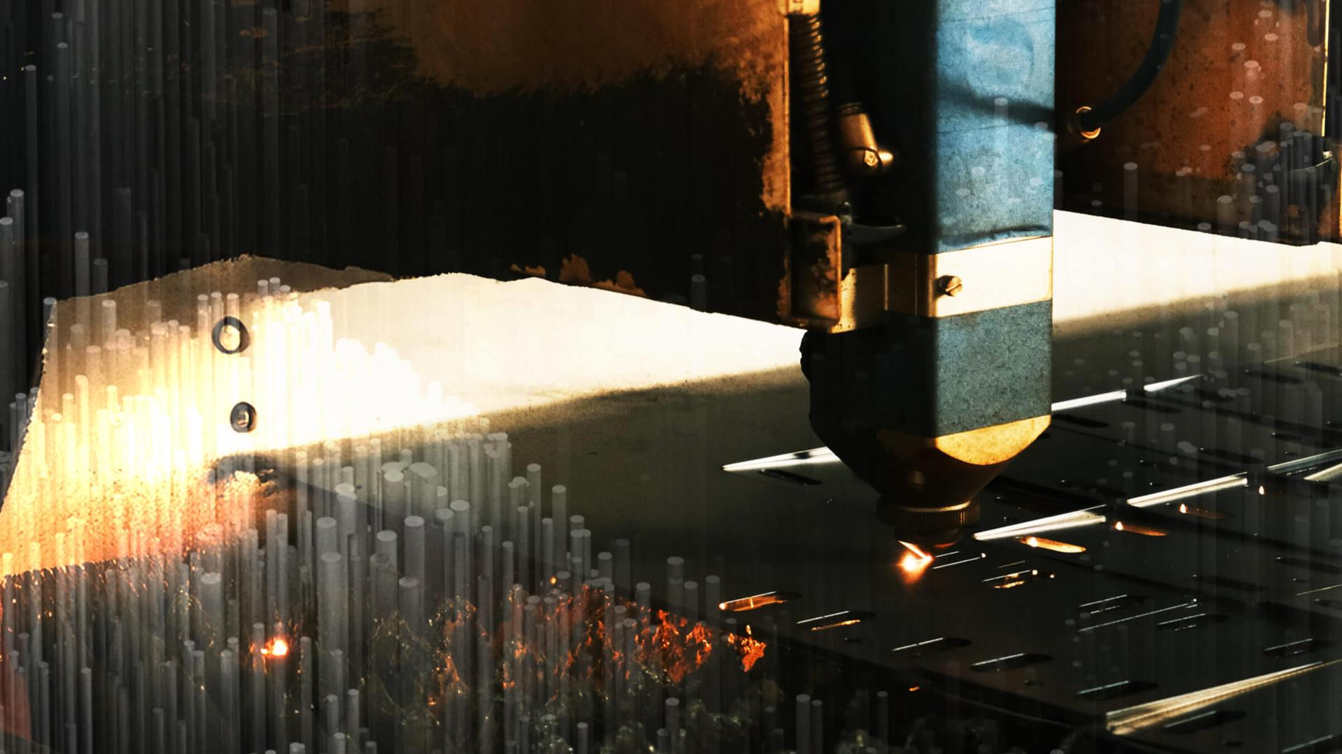 A laser cutting machine precisely cuts through a metal sheet, emitting sparks and a bright glow, with cylindrical patterns in the background.